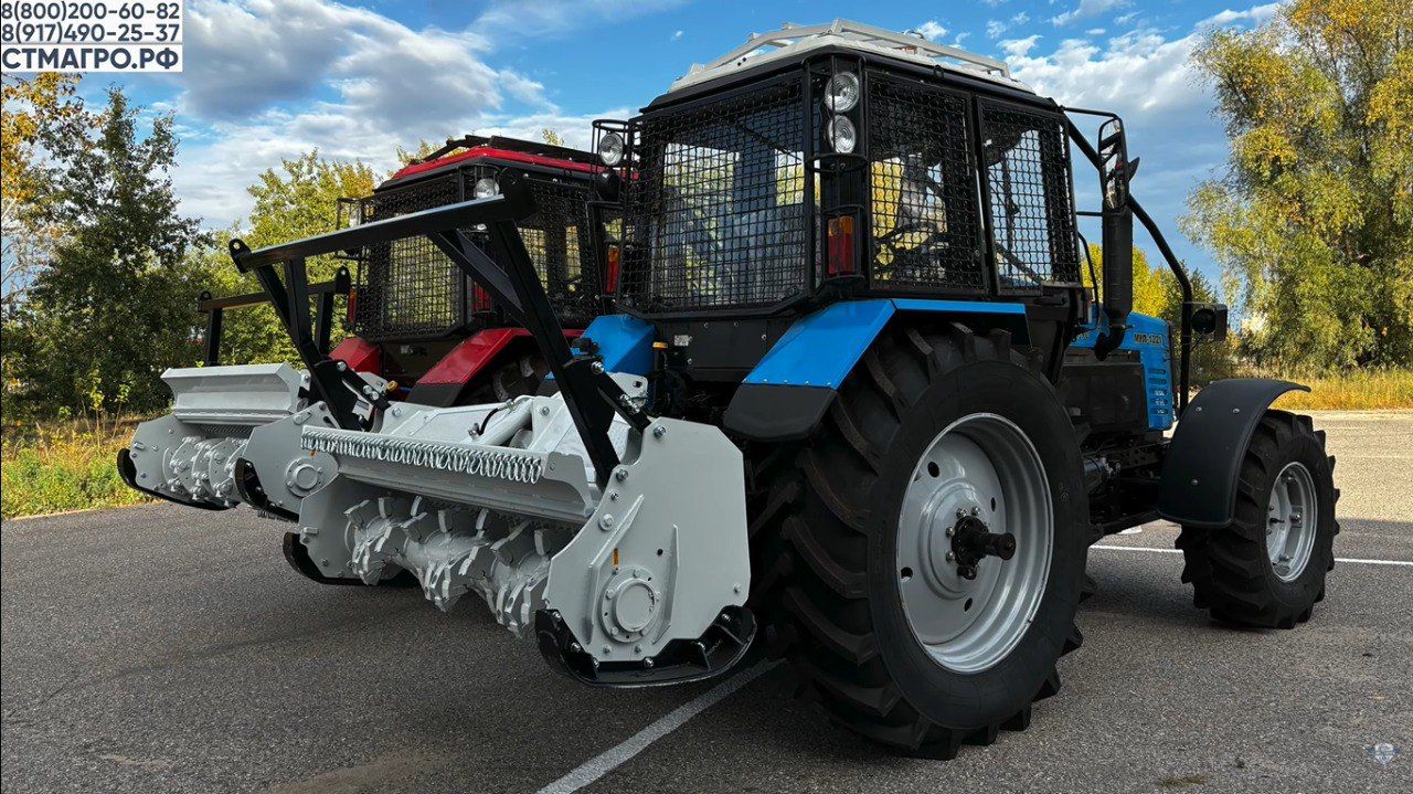 МТЗ с мульчером популярный вариант для легкой расчистки