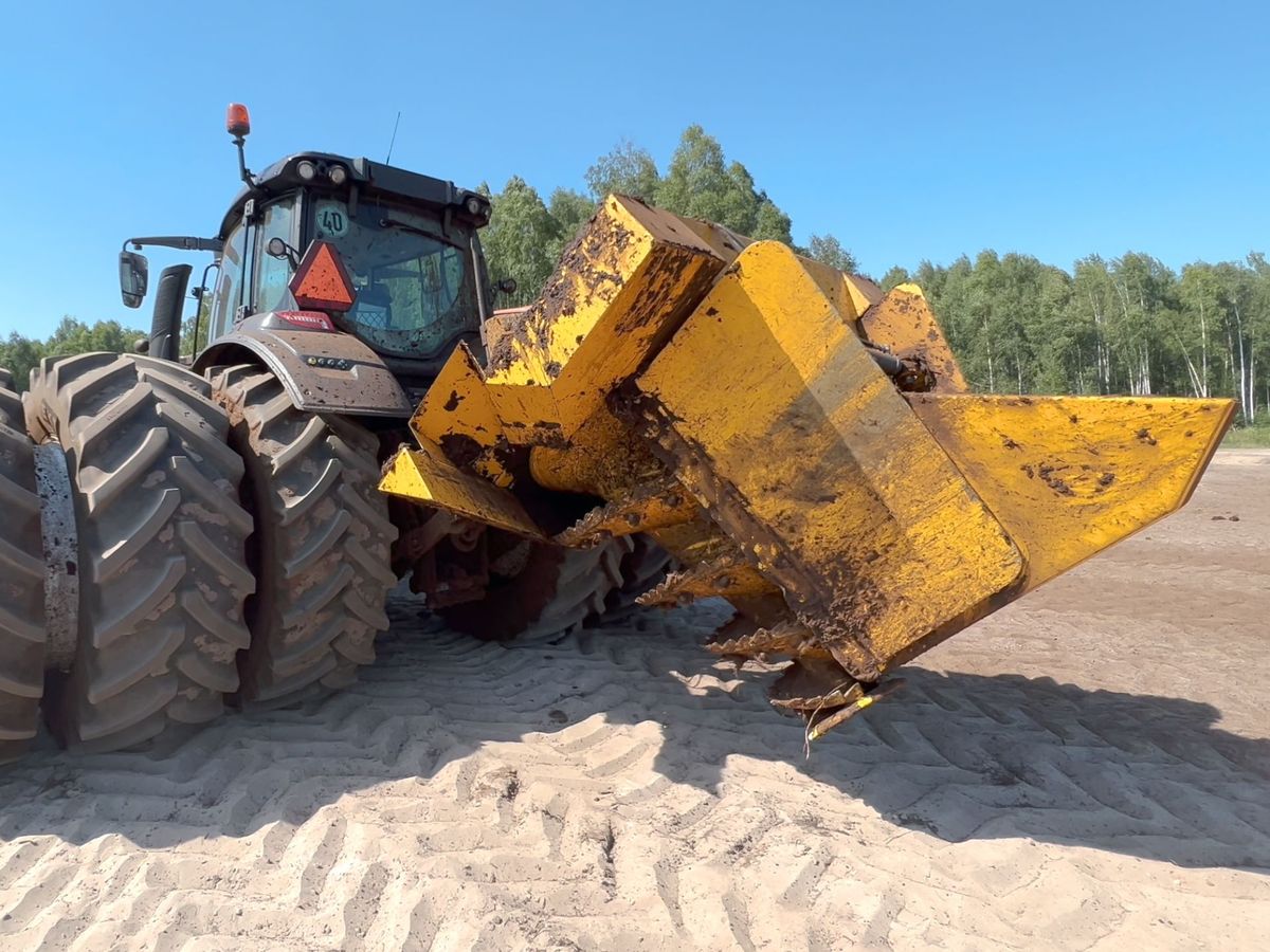 Траншеекопатель (Канавокопатель шнековый)