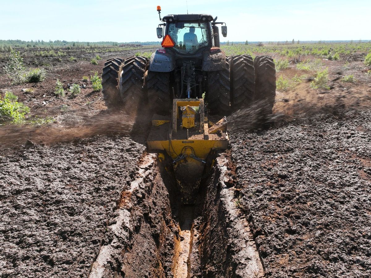 Траншеекопатель (Канавокопатель шнековый)