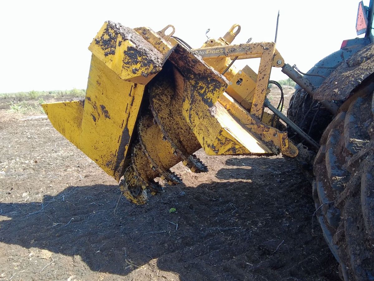 Траншеекопатель (Канавокопатель шнековый)