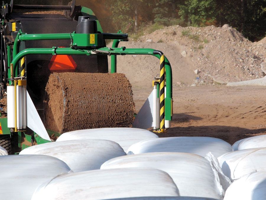 Пресс-упаковщик силоса и корма (пресс-обмотчик)